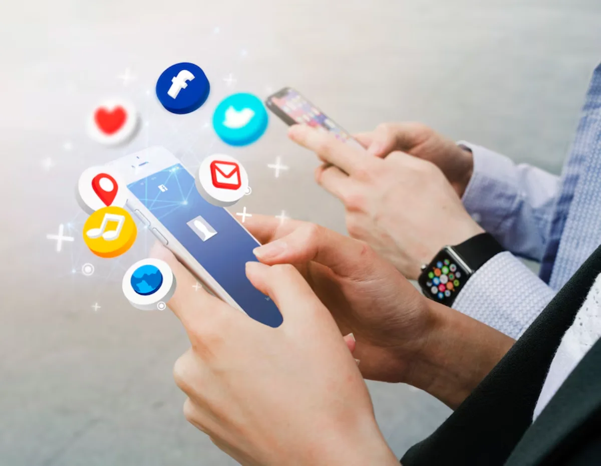 Two people using smartphones with floating social media icons around them, illustrating digital connectivity and app usage.