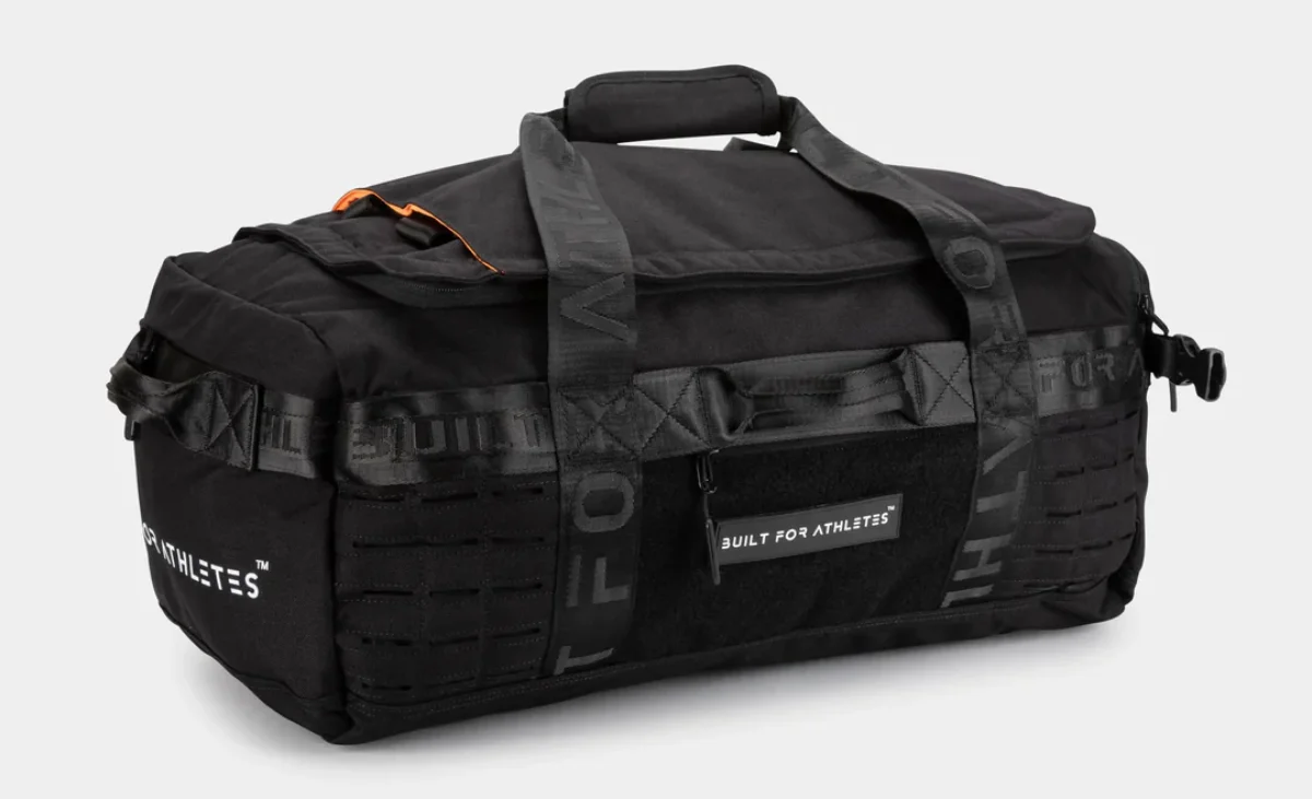 A large black duffel bag with text branding, designed for athletes, displayed on a white background.